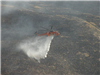 Helicopter Controlling the Fire with Water